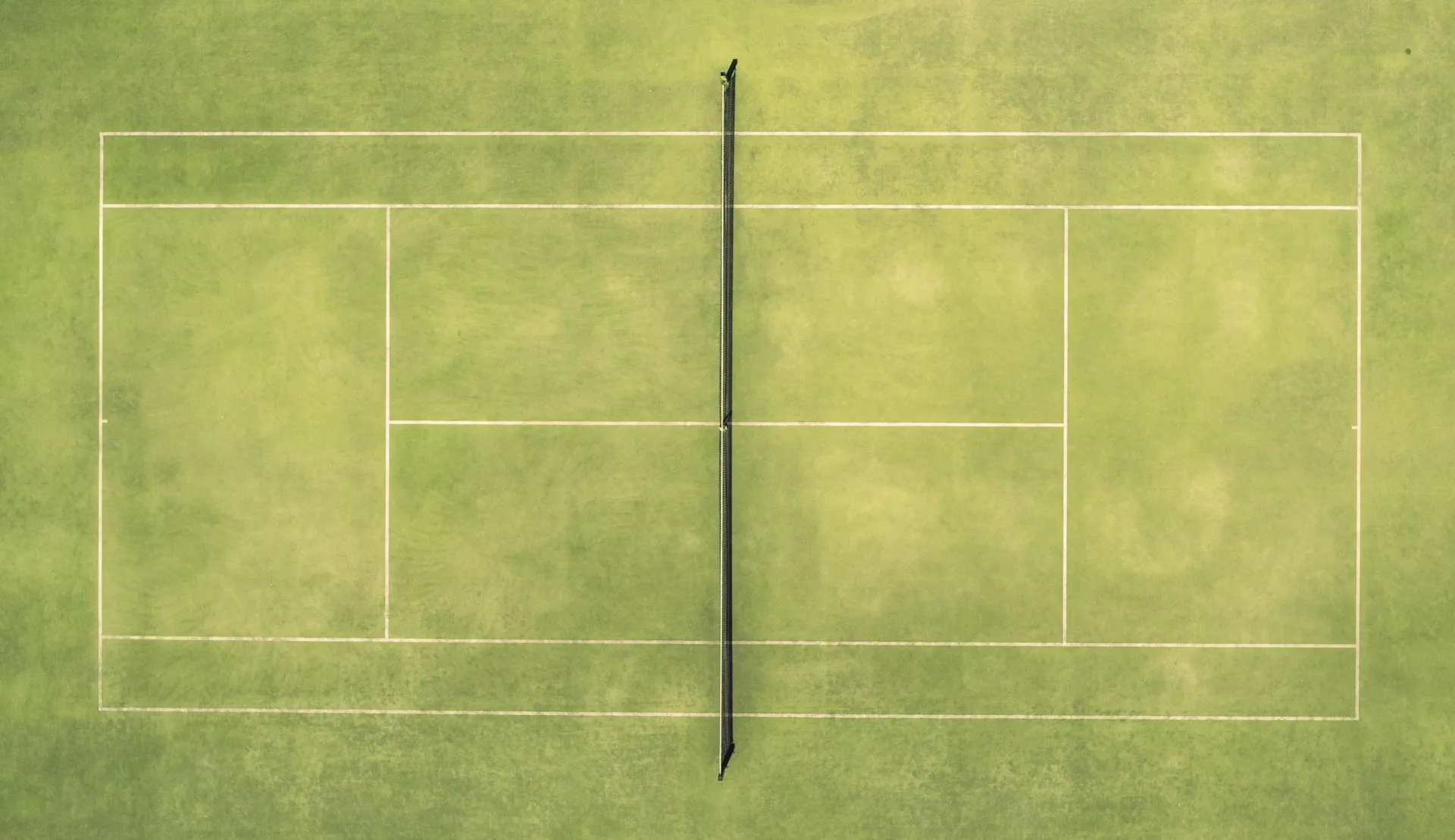 Padel court with markings and glass walls
